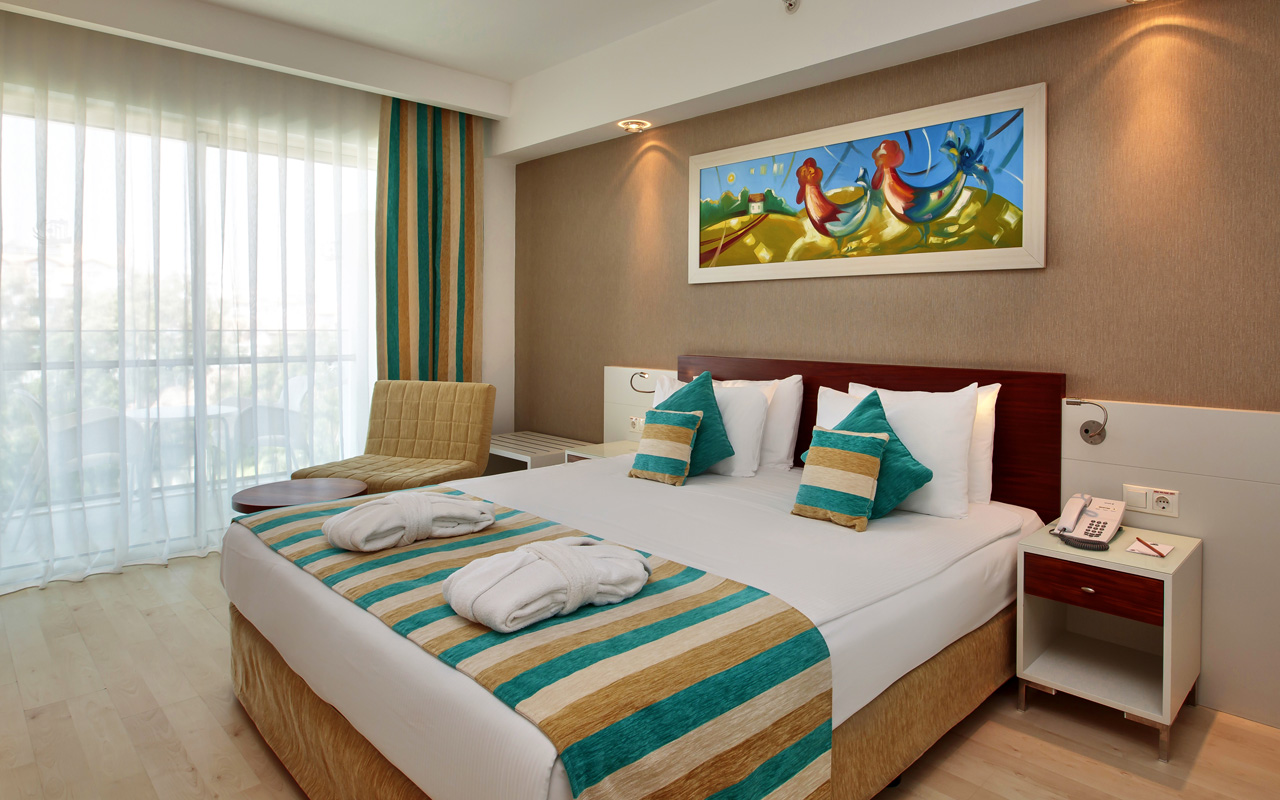 Suni resort. Санис Эврен Бич. Standard Room Sea Side view. Номер Deluxe с частичным видом на море и бассейн Lara Barut. Room Side.