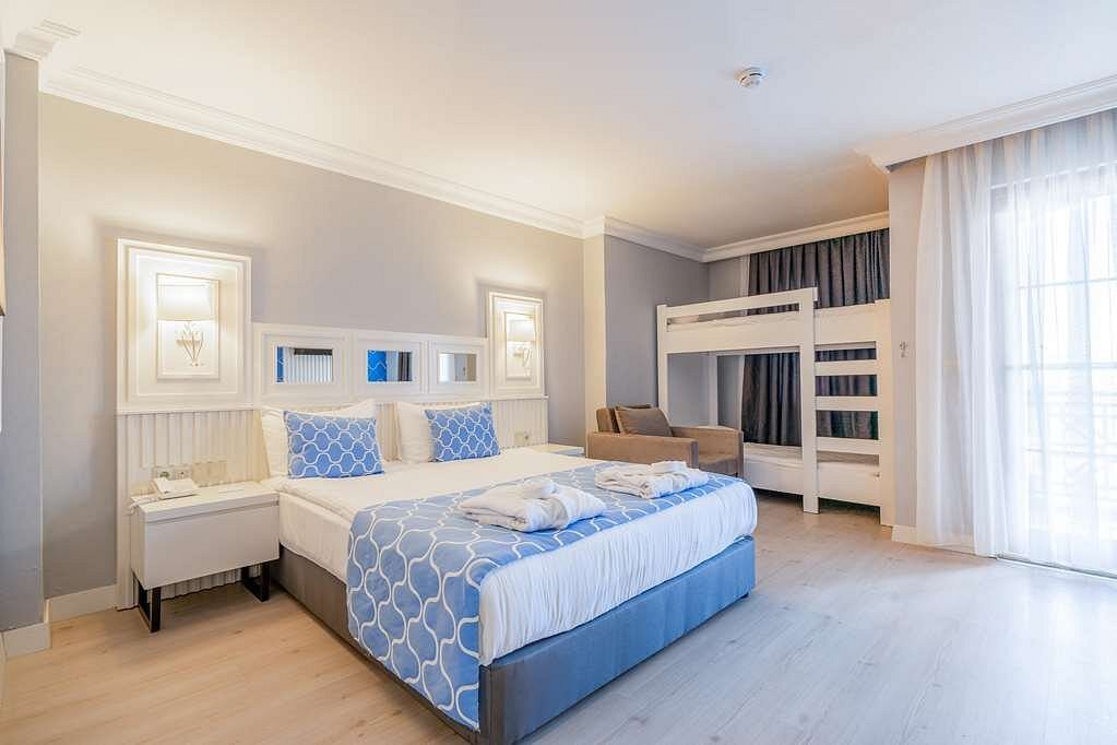 Eftalia downtown hotel. Bunkbed room что это за номер. Crystal green bay resort spa 5. Standard room land view. Family — family room номер в гостинице.
